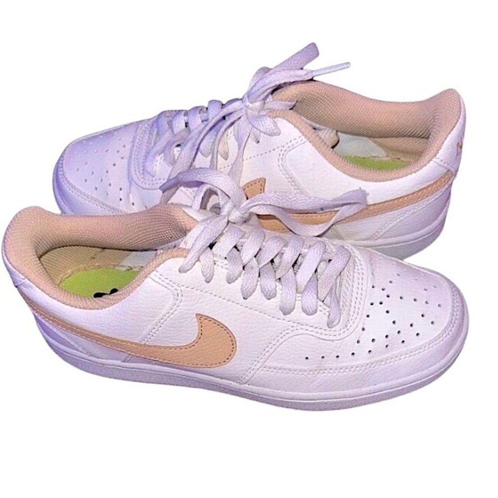 Nike ladies size 7.5 White and Peach tennis shoes